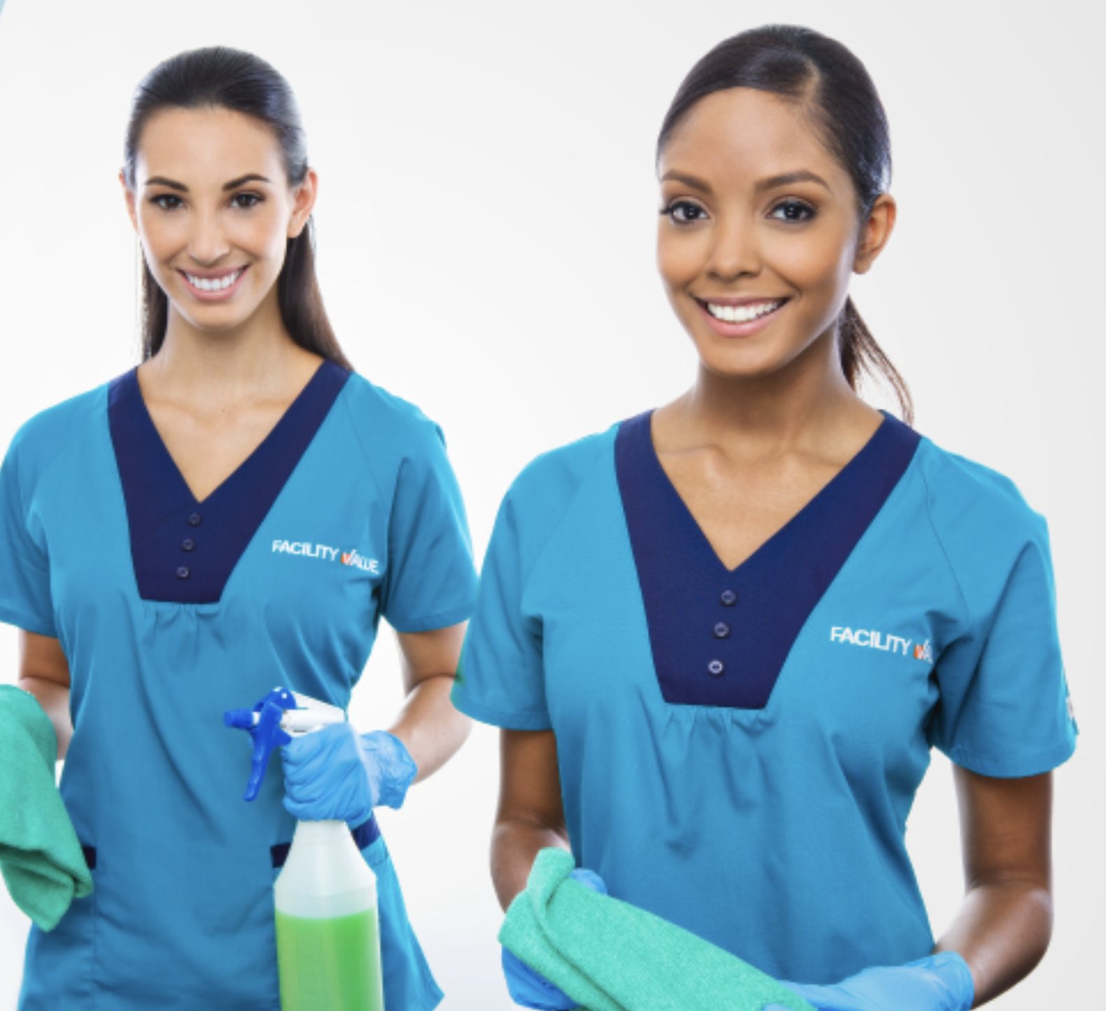 Two Facility Value cleaning professionals in branded uniforms